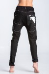 Trousers in black with faux cowhide inserts