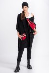 Poncho sweater in black with red tartan inserts